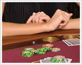 Crossed arms on the table means the count is running high